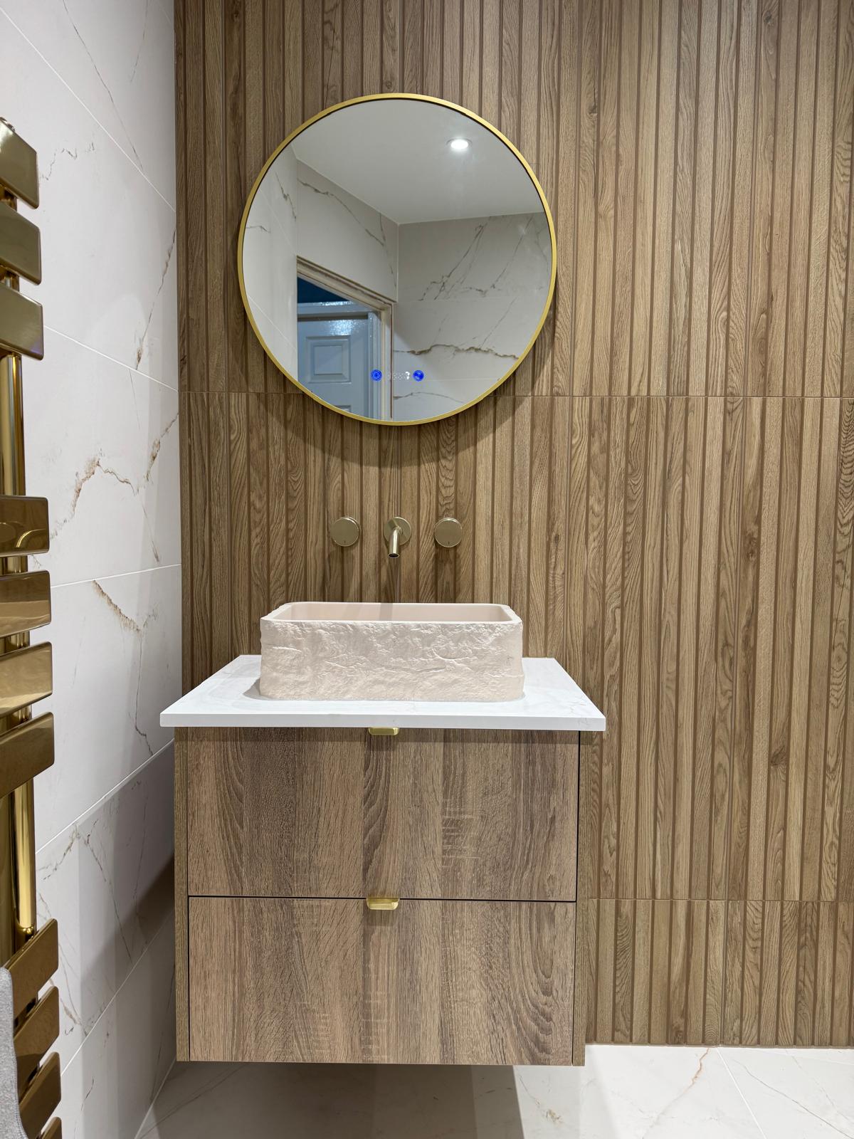 Luxury bathroom vanity unit with stone basin and illuminated mirror by MDS NE